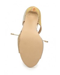 Золотые босоножки на каблуке от Stephan