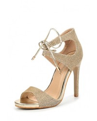 Золотые босоножки на каблуке от Stephan