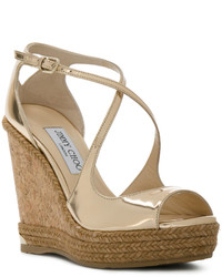 Золотые босоножки на танкетке от Jimmy Choo