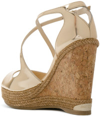 Золотые босоножки на танкетке от Jimmy Choo