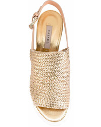 Золотые босоножки на танкетке от Casadei