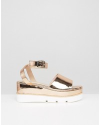 Золотые босоножки на танкетке от Asos