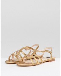 Женские золотые босоножки от Mango