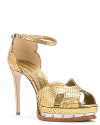 Женские золотые босоножки от Alexander McQueen