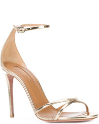 Женские золотые босоножки от Aquazzura