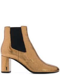 Женские золотые ботинки от Saint Laurent