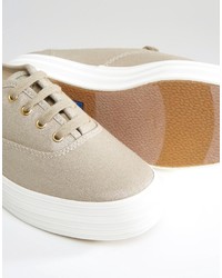 Женские золотые кеды из плотной ткани от Keds