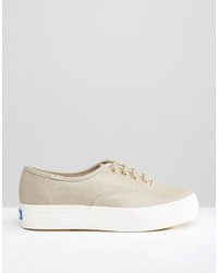 Женские золотые кеды из плотной ткани от Keds