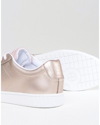 Женские золотые кеды от Lacoste