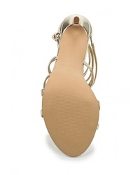 Золотые кожаные босоножки на каблуке от Aldo