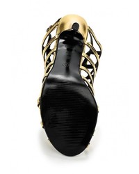 Золотые кожаные босоножки на каблуке от Anne Michelle