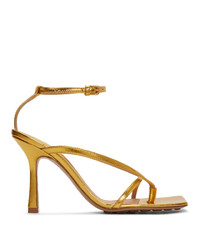 Золотые кожаные босоножки на каблуке от Bottega Veneta