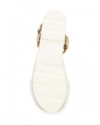 Золотые кожаные босоножки на каблуке от Diamantique