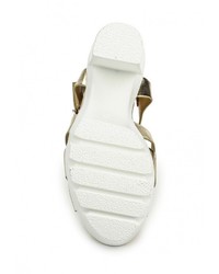 Золотые кожаные босоножки на каблуке от Diamantique