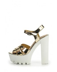 Золотые кожаные босоножки на каблуке от Diamantique