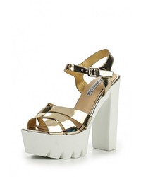 Золотые кожаные босоножки на каблуке от Diamantique