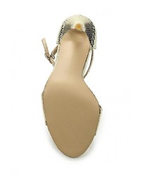 Золотые кожаные босоножки на каблуке от Dino Ricci Select