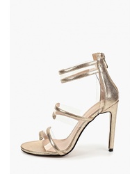 Золотые кожаные босоножки на каблуке от Diora.rim