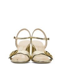 Золотые кожаные босоножки на каблуке от Gucci