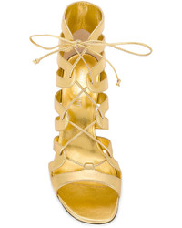 Золотые кожаные босоножки на каблуке от Saint Laurent