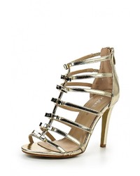 Золотые кожаные босоножки на каблуке от Mada-Emme