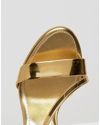 Золотые кожаные босоножки на каблуке от Dune