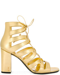 Золотые кожаные босоножки на каблуке от Saint Laurent