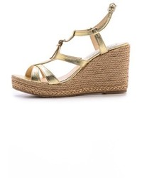 Золотые кожаные босоножки на танкетке от LK Bennett