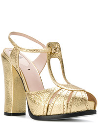 Женские золотые кожаные босоножки от Fendi