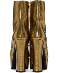 Золотые кожаные ботильоны от Saint Laurent