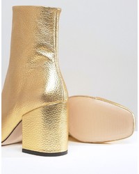 Женские золотые кожаные ботинки от Mango