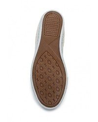 Золотые кожаные кроссовки на танкетке от Justin