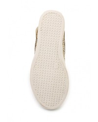 Золотые кожаные кроссовки на танкетке от Via Giulia