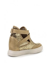 Золотые кожаные кроссовки на танкетке от Via Giulia