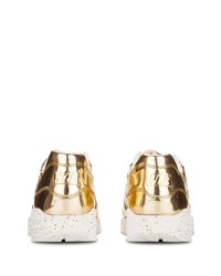 Мужские золотые кожаные кроссовки от Nike