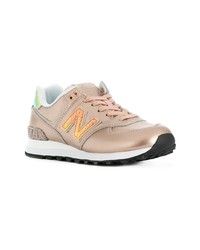 Женские золотые кожаные низкие кеды от New Balance