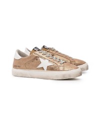 Женские золотые кожаные низкие кеды от Golden Goose Deluxe Brand