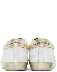 Женские золотые кожаные низкие кеды от Golden Goose Deluxe Brand
