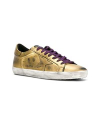 Мужские золотые кожаные низкие кеды от Golden Goose Deluxe Brand