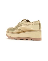 Женские золотые кожаные оксфорды от Prada