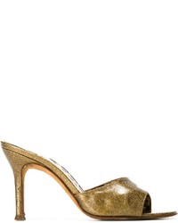 Золотые кожаные сабо от Dolce & Gabbana