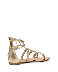 Золотые кожаные сандалии на плоской подошве от Call it SPRING