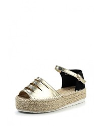 Золотые кожаные сандалии на плоской подошве от Ideal