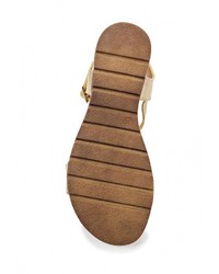 Золотые кожаные сандалии на плоской подошве от Mixfeel