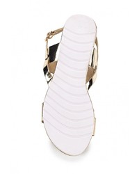 Золотые кожаные сандалии на плоской подошве от Renda