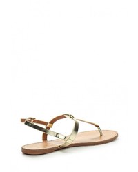 Золотые кожаные сандалии на плоской подошве от Spurr