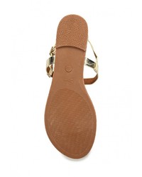 Золотые кожаные сандалии на плоской подошве от Spurr