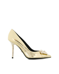 Золотые кожаные туфли с украшением от Versace