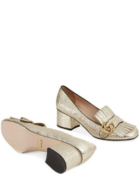 Золотые кожаные туфли от Gucci