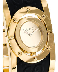 Женские золотые кожаные часы от Gucci